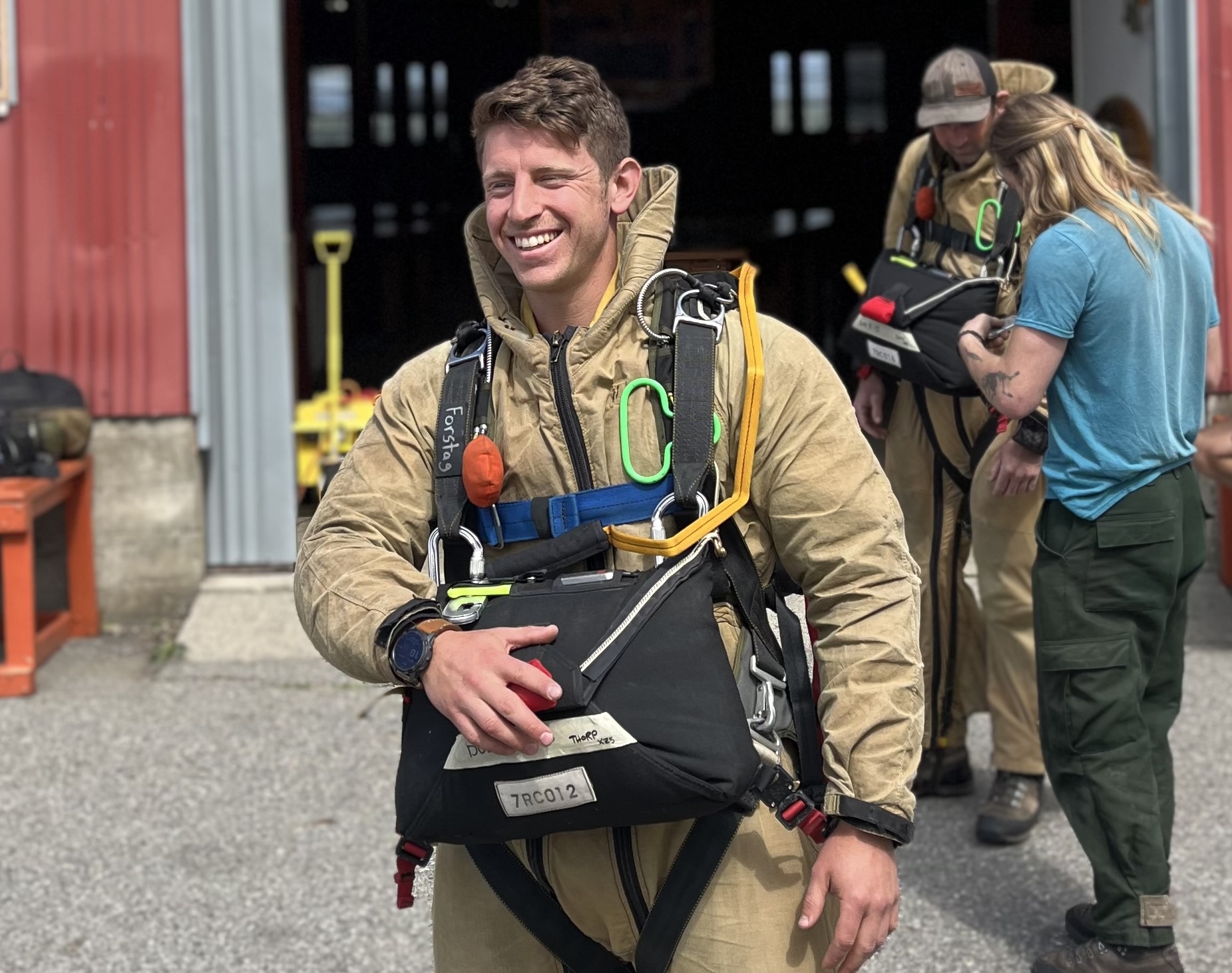 Sam Forstag in firefighter jump suit